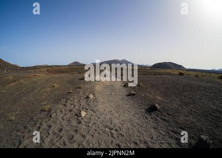 Typische Vulkanlandschaft im Gebiet der Caldera de Los Cuervos. Lanzarote, Kanarische Inseln. Spanien. Stockfoto