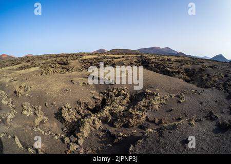 Typische Vulkanlandschaft im Gebiet der Caldera de Los Cuervos. Lanzarote, Kanarische Inseln. Spanien. Stockfoto