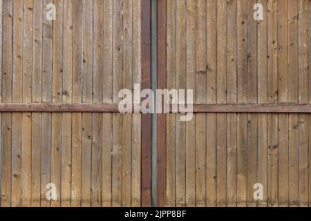 Hintergrund einer alten Holztür. Platz für eine Inschrift. Platz kopieren. Stockfoto