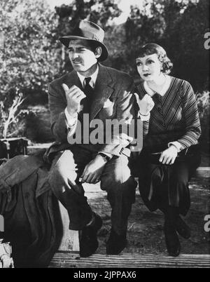 1934 , USA : Die Filmschauspieler CLARK GABLE und CLAUDETTE COLBERT in IHM GESCHAH EINES NACHTS ( Accadde una notte ) von FRANK CAPRA , Columbia Productions - KINO - FILM - AUTOSTOP - Hut - cappello - Baffi - Schnurrbart - Krawatte - Cravatta - Portrait - ritratto ---- Archivio GBB Stockfoto