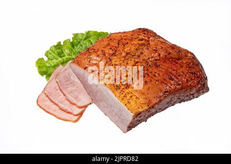 Geräuchertes Rindfleisch und Grün auf einem isolierten studio Hintergrund Stockfoto