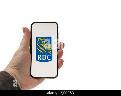 Cardiff Mid Glamorgan UK 20 2022. August Person mit Mobiltelefon und RBC Bank Logo auf weißem Hintergrund Stockfoto