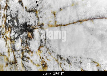 Vollbildaufnahme des Hintergrunds aus Marmorplatten, Nahaufnahme. Gelbe und graue Farben Stockfoto