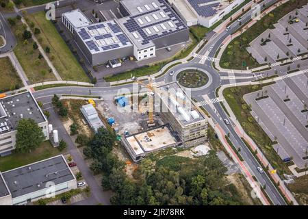 Luftbild, Phoenix-West Areal mit Baustelle für Neubau am Kreisverkehr Nortkirchenstraße und Olof-Palme-Straße im Stadtteil Hörde in Dortmund, Ruhrgebi Stockfoto