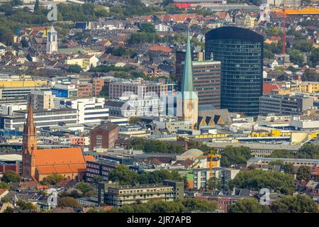 Blick in die Innenstadt mit der Grabeskirche, der St. Peter-Lutherischen Kirche, dem Sparkassenhochhaus und dem RWE-Turm im Stadtteil Dortmund, R Stockfoto