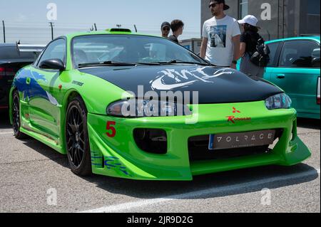 Ein grüner Mitsubishi Eclipse der zweiten Generation, abgestimmt im Stil von Brian O'Conner von Fast and Furious Stockfoto