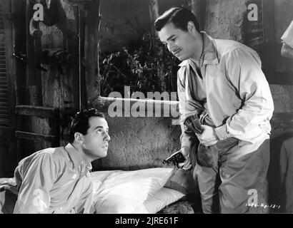 GERALD MOHR als Slick Latimer und TOM NEAL als Jack Stanton in Episode 13 des 15 Chapter Serial JUNGLE GIRL 1941 die Regisseure JOHN ENGLISH und WILLIAM WITNEY basierten lose auf dem Roman von Edgar Rick Burroughs und dekorierten Morris Braun Associate Producer Hiram S. Brown Jr. Republic Pictures Stockfoto