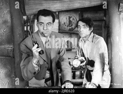 GERALD MOHR als Slick Latimer und TREVOR BARDETTE als Bradley Meredith in Episode 14 des 15 Chapter Serial JUNGLE GIRL 1941 Regisseure JOHN ENGLISH und WILLIAM WITNEY, die lose auf dem Roman von Edgar Rick Burroughs basieren, setzen Dekoration für Morris Braun Associate Producer Hiram S. Brown Jr. Republic Picturs Stockfoto