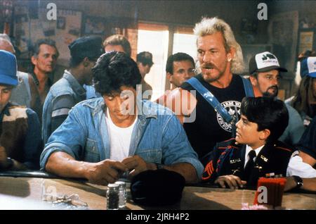 SYLVESTER STALLONE, Terry Funk, DAVID MENDENHALL, ÜBER DER OBERSEITE, 1987 Stockfoto