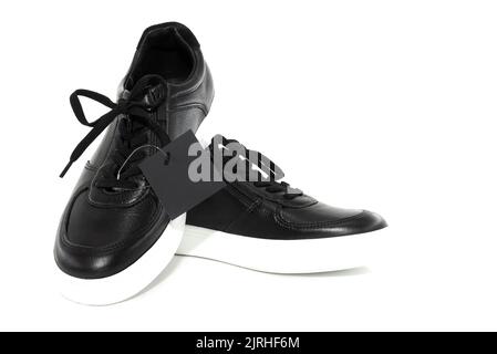 Schnürsenkel. Schnürschuh für Freizeit- oder Sportschuhe aus nächster Nähe auf weißem Hintergrund. Schuhe Hintergrund Stockfoto