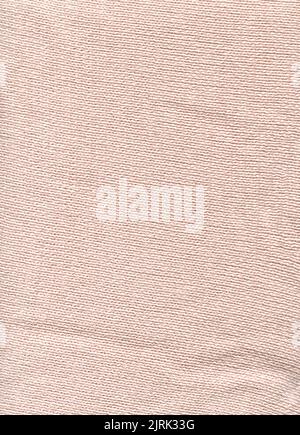 Baumwolle cremefarbenen Stoff gewebte Leinwand für Winter-Design. Wollbeige Frische Pullover dekorativer Hintergrund. Stockfoto