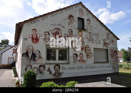 SCHIFFERSTADT, Deutschland 25. AUGUST 2022: Geburtsort und Elternhaus des deutschen Olympiasiegers Wilfried Dietrich in Schifferstadt. Stockfoto