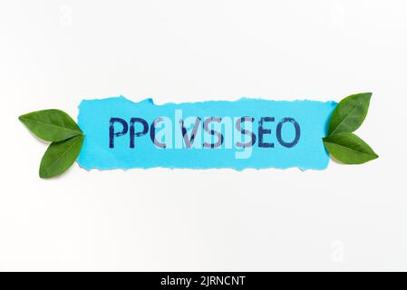 Textunterschrift mit PPC vs. Seo. Internet Concept Pay per click gegen Suchmaschinen-Optimierungsstrategien Geschäftsmann Überprüfung Kreis Taste von Stockfoto