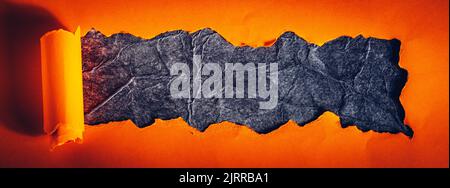 Orangefarbenes und schwarzes Papier für Halloween-Textur-Hintergrund Stockfoto