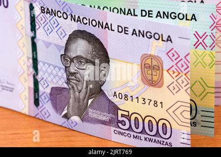 Angolanische Geld - kwanza ein geschäftlicher Hintergrund Stockfoto