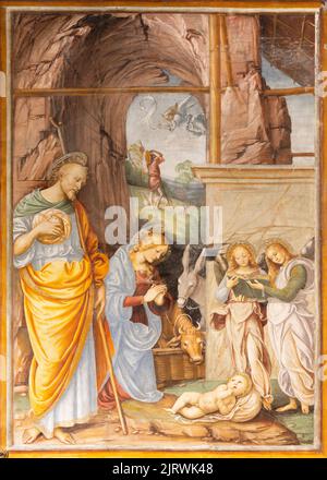 VARALLO, ITALIEN - 17. JULI 2022: Das Renaissance-Fresko der Geburt in der Kirche Santa Maria delle Grazie von Gaudenzio Ferrari (1513). Stockfoto