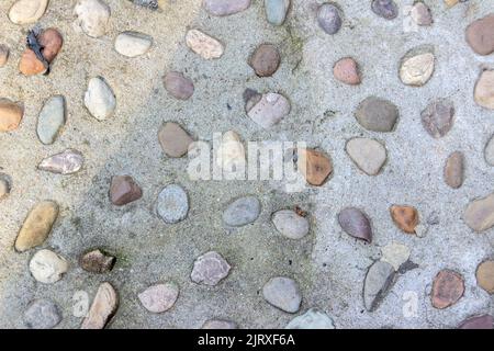 Textur von Steinen auf einer grauen Wand in Rio de Janeiro Brasilien erstellt.. Stockfoto