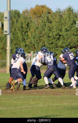 Herbstsport, Jugend American Football Stockfoto