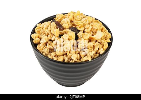 Müslischale mit Rosinen, Nüssen. Hausgemachte knusprige Granola isoliert auf weißem Hintergrund. Gesunde Ernährung. Datei enthält Beschneidungspfad. Stockfoto