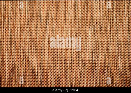 Textil-Pastell-Hintergrund mit abstraktem Webt aus Fäden. Mehrfarbiger Hintergrund aus getufteten Stoffen. Stockfoto