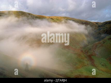 Brocken Spectre über dem Devils Beef Tub, in der Nähe von Moffat in Schottland Stockfoto