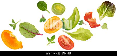 Fallendes Gemüse, Salat aus Paprika, Tomaten und Salatblättern Stockfoto