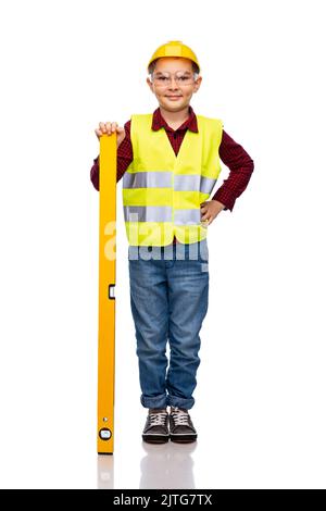 Kind Junge mit Konstruktion Ebene Weste und Helm isoliert auf weiß,  zukünftige Bauarbeiter Stockfotografie - Alamy