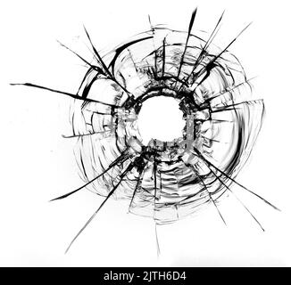 Risse im Glas, ein Loch aus Kugeln im Glas auf weißem Hintergrund. Glasstruktur des Fensters. Stockfoto