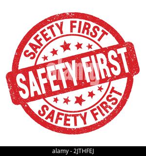 SICHERHEIT ERSTER Text auf rotem grungy Stempelschild geschrieben. Stockfoto