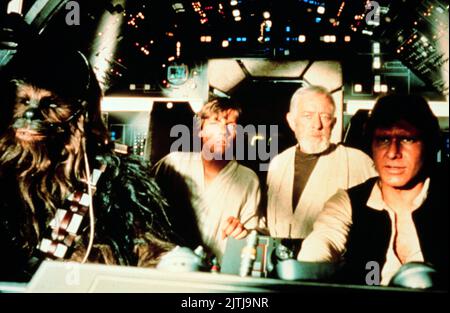 Star Wars, aka Krieg der Sterne, USA 1977, Regie: George Lucas, Charaktere: Chewbacca, Mark Hamill als Luke Skywalker, Alec Guinness als Obi Wan Kenobi und Harrison Ford als Han Solo Stockfoto