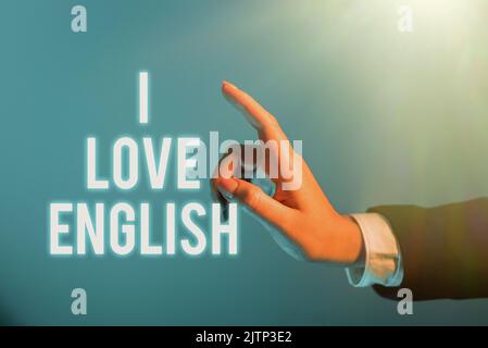 Text-Zeichen zeigt I Love English, Konzept Bedeutung Zuneigung für internationale Sprache Grammatik Geschäftsmann in Anzug halten Notizblock symbolisieren haben Stockfoto