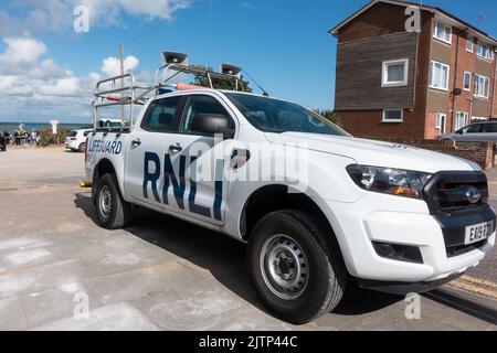 RNLI (Royal National Lifeboat Institution) Fahrzeug auf der Klippe in Botany Bay geparkt Stockfoto