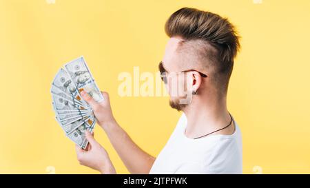 Erfolgreicher reicher Hipster Kerl Portrait Geld Fan Stockfoto