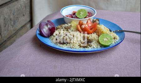 Kenianischer Pilau mit Hammelfleisch gekocht. Stockfoto