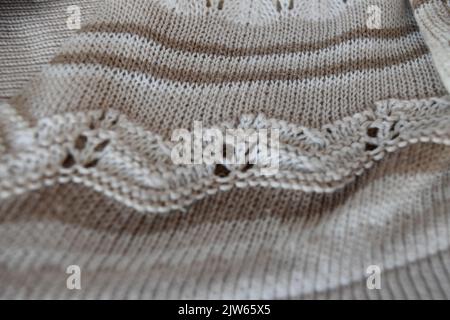 Die Textur eines braunen Wollgewebes Stockfoto