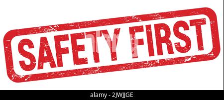 SICHERHEIT ERSTER Text auf rotem Rechteck Stempelzeichen geschrieben. Stockfoto
