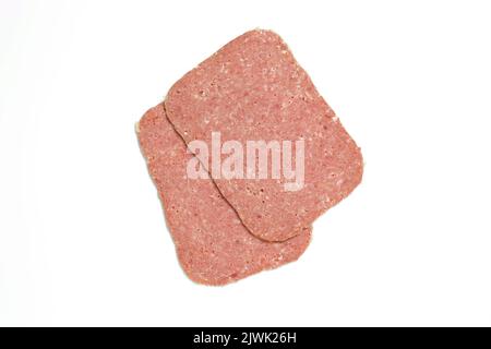 Zwei Scheiben Corned Beef isoliert auf weißem Hintergrund ausgeschnitten Stockfoto