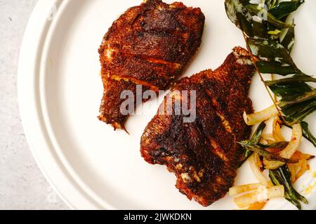 Masala beschichtete Kerala-Fischbrut, selektiver Fokus Stockfoto