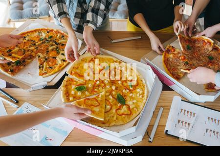 Pizza Business Team Mittagessen ungesunde köstliche Mahlzeit Stockfoto