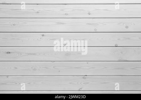 Weiße Holzwand aus bemalten Kiefernholzplanken, Hintergrund Foto Textur Stockfoto