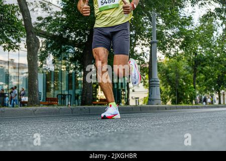 Die Beine Läufer Athlet läuft Street Marathon Stockfoto