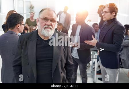 Porträt eines Senior Manager mit Brille Stockfoto
