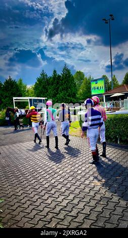 Jockeys bei den Rennen Stockfoto