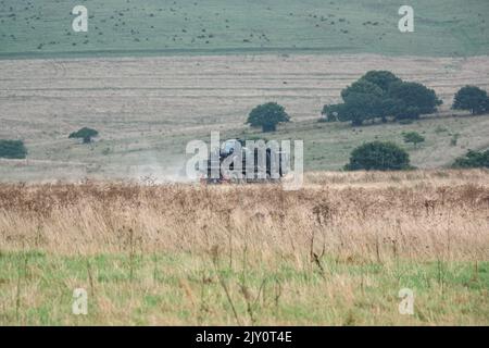 British Army MAN HX77 SV 8x8 EPLS Heavy Utility Truck in Aktion bei einer militärischen Übung Stockfoto