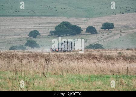 British Army MAN HX77 SV 8x8 EPLS Heavy Utility Truck in Aktion bei einer militärischen Übung Stockfoto