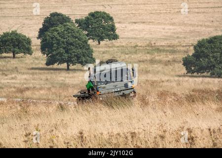 British Army MAN HX58 6x6 Heavy Utility Truck EPLS in Aktion bei einer militärischen Übung Stockfoto