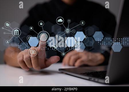 Biometrische Identifizierung Fingerabdruckscanner mit futuristischer digitaler Verarbeitung für den Zugriff auf persönliche Finanzdaten digitale Programmüberwachung und Stockfoto