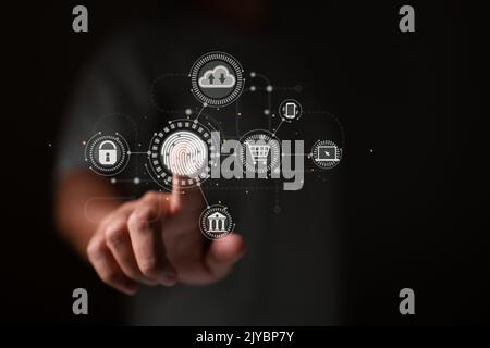 Ein Online-Geschäftsmann scannt seinen Fingerabdruck, um sich einem virtuellen Payment-Shopping-Banking- und Cloud-Computing-Netzwerk anzuschließen. Stockfoto