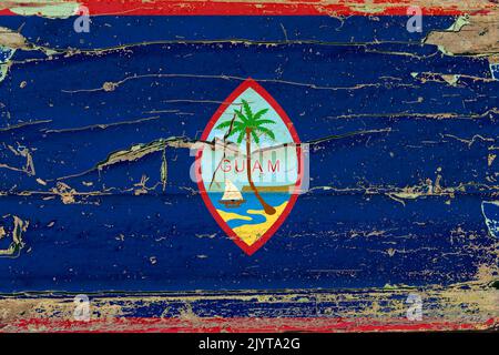 3D Flagge von Guam auf einem alten Holzwandhintergrund. Stockfoto