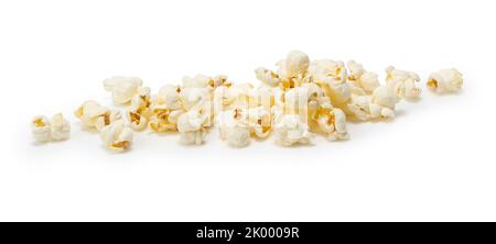 Viel Popcorn auf weißem Hintergrund. Stockfoto
